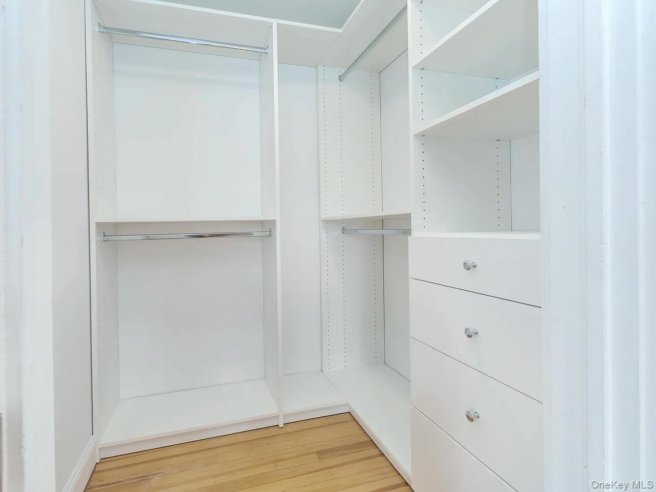 Primary Bedroom with Renovated Walk In Closet Primary Bedroom with Renovated Walk In Closet