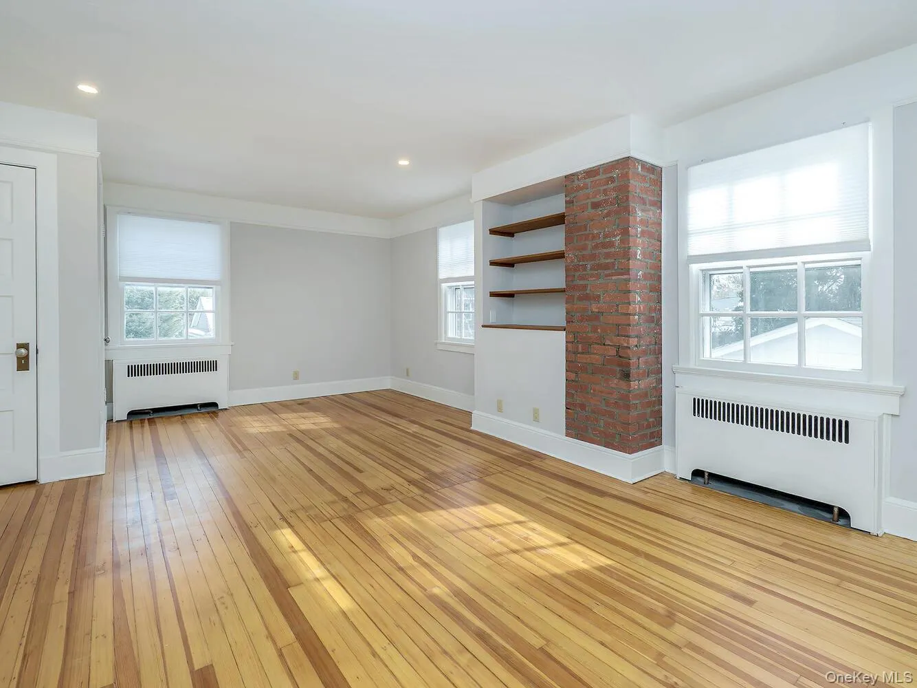 Primary Bedroom with Beautiful Wood Floors Primary Bedroom with Beautiful Wood Floors