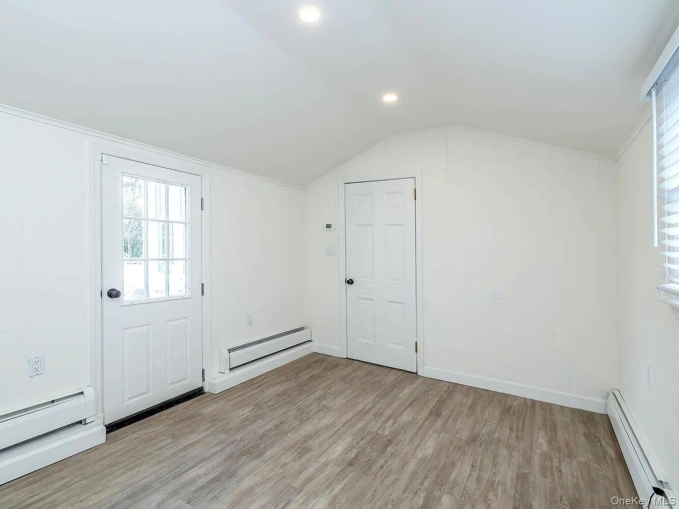 Office or Mud Room off the Two Car Garage and door to the Yard Office or Mud Room off the Two Car Garage and door to the Yard