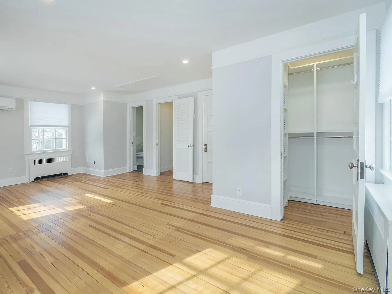 Spacious Primary Bedroom with Three Closets Spacious Primary Bedroom with Three Closets