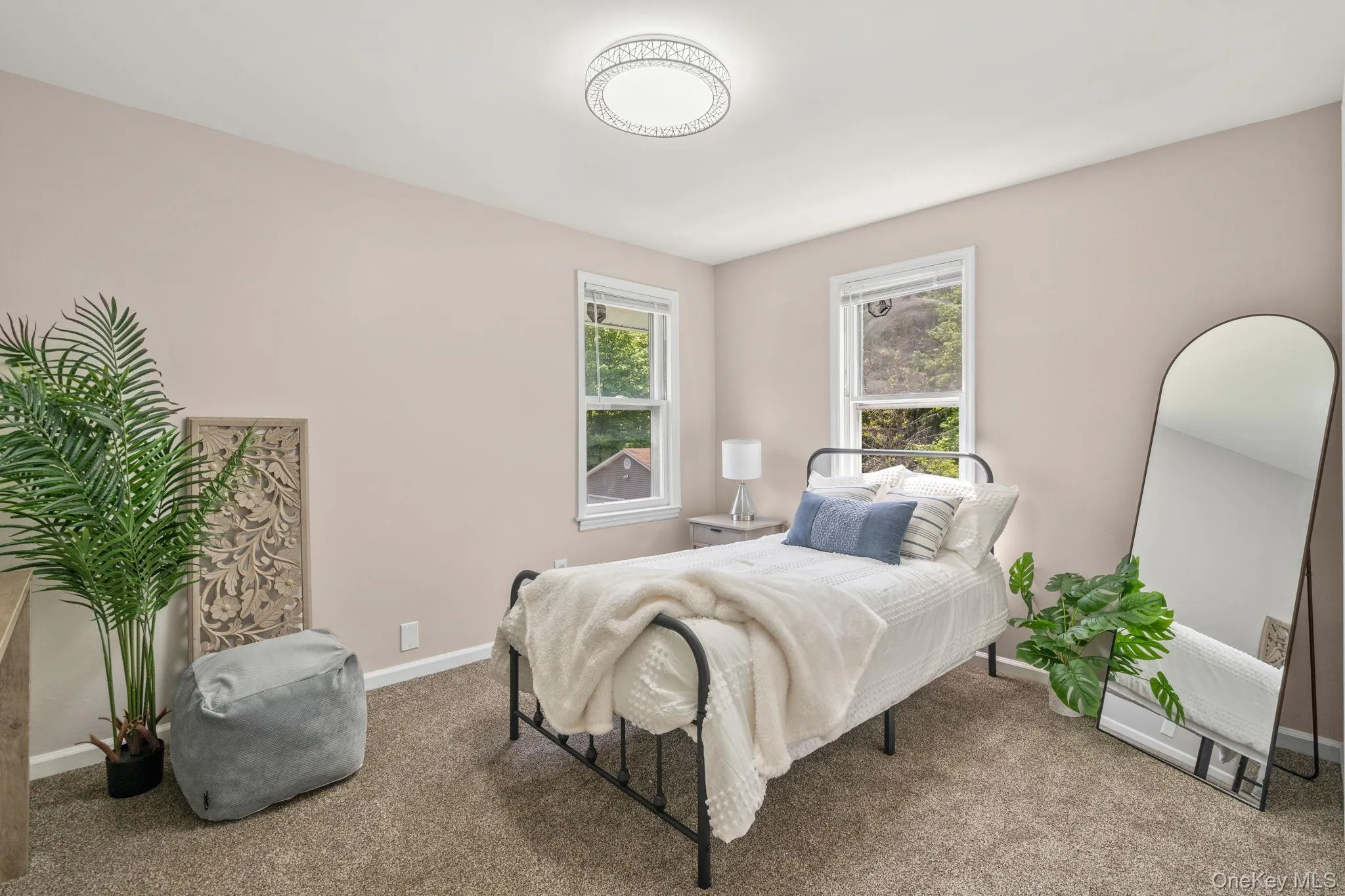 Bedroom featuring carpet floors Bedroom featuring carpet floors