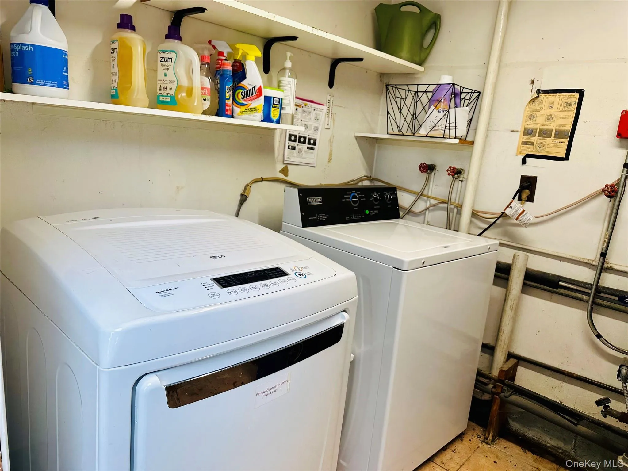 Laundry room featuring independent washer and dryer Laundry room featuring independent washer and dryer