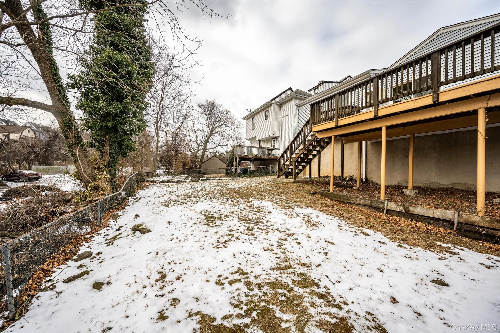 Early spring improvements to include removal of the chain-link fence (to be replaced with a stone wall or hedging), updated landscaping, and deck refinishing. Early spring improvements to include removal of the chain-link fence (to be replaced with a stone wall or hedging), updated landscaping, and deck refinishing.