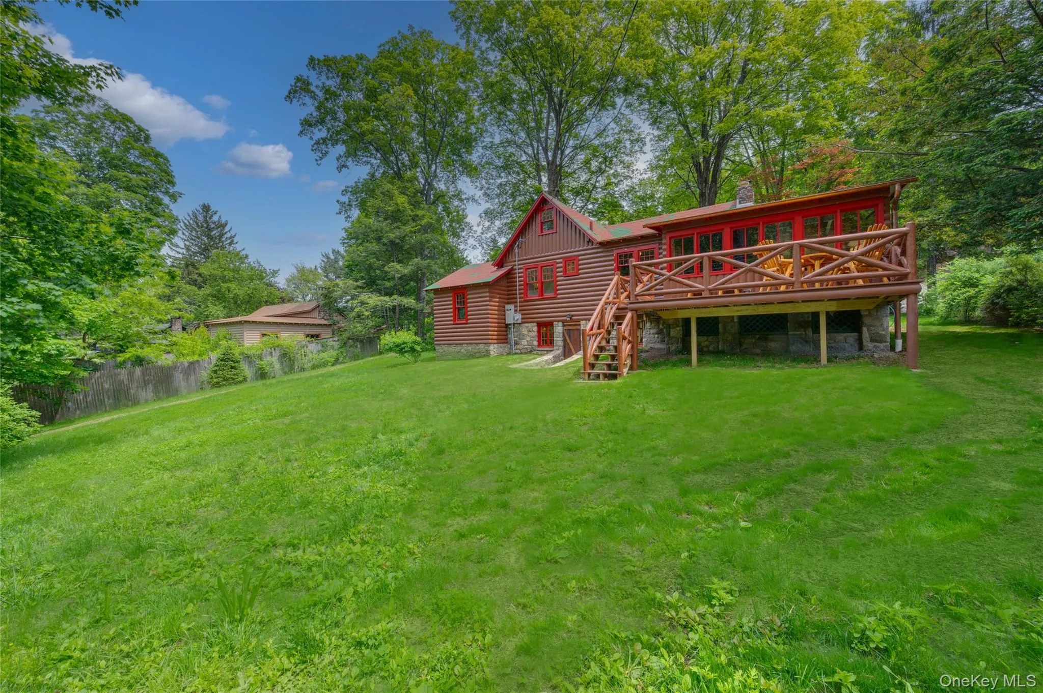 View of yard with a deck View of yard with a deck