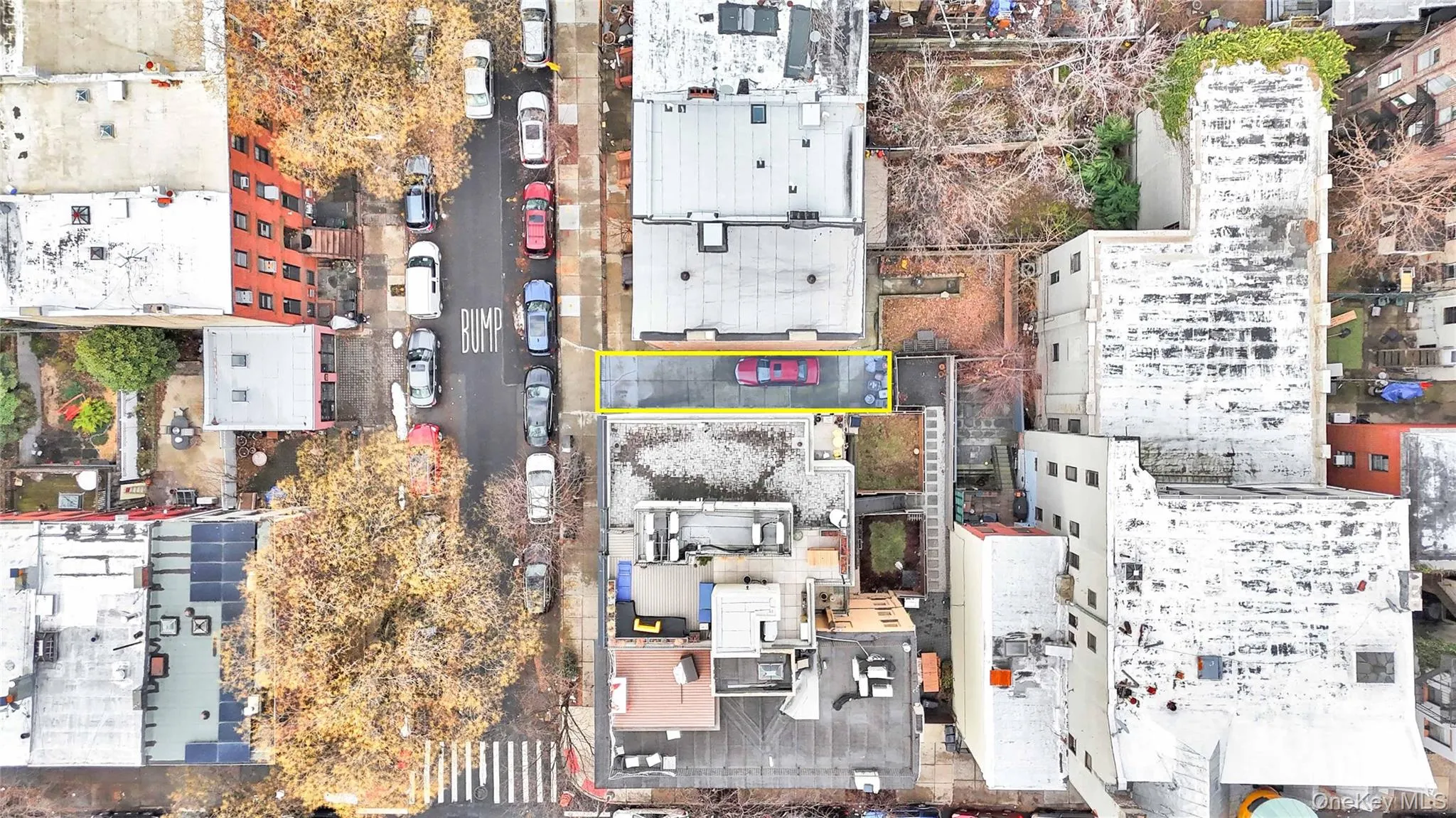 View of urban area with property boundaries highlighted View of urban area with property boundaries highlighted