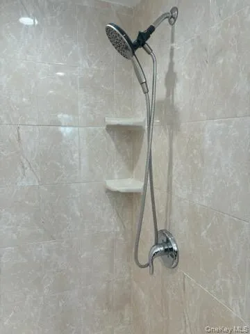 Bathroom view of tiled shower Bathroom view of tiled shower