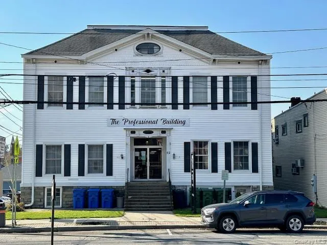 View of front of house featuring roof with shingles and entry steps View of front of house featuring roof with shingles and entry steps