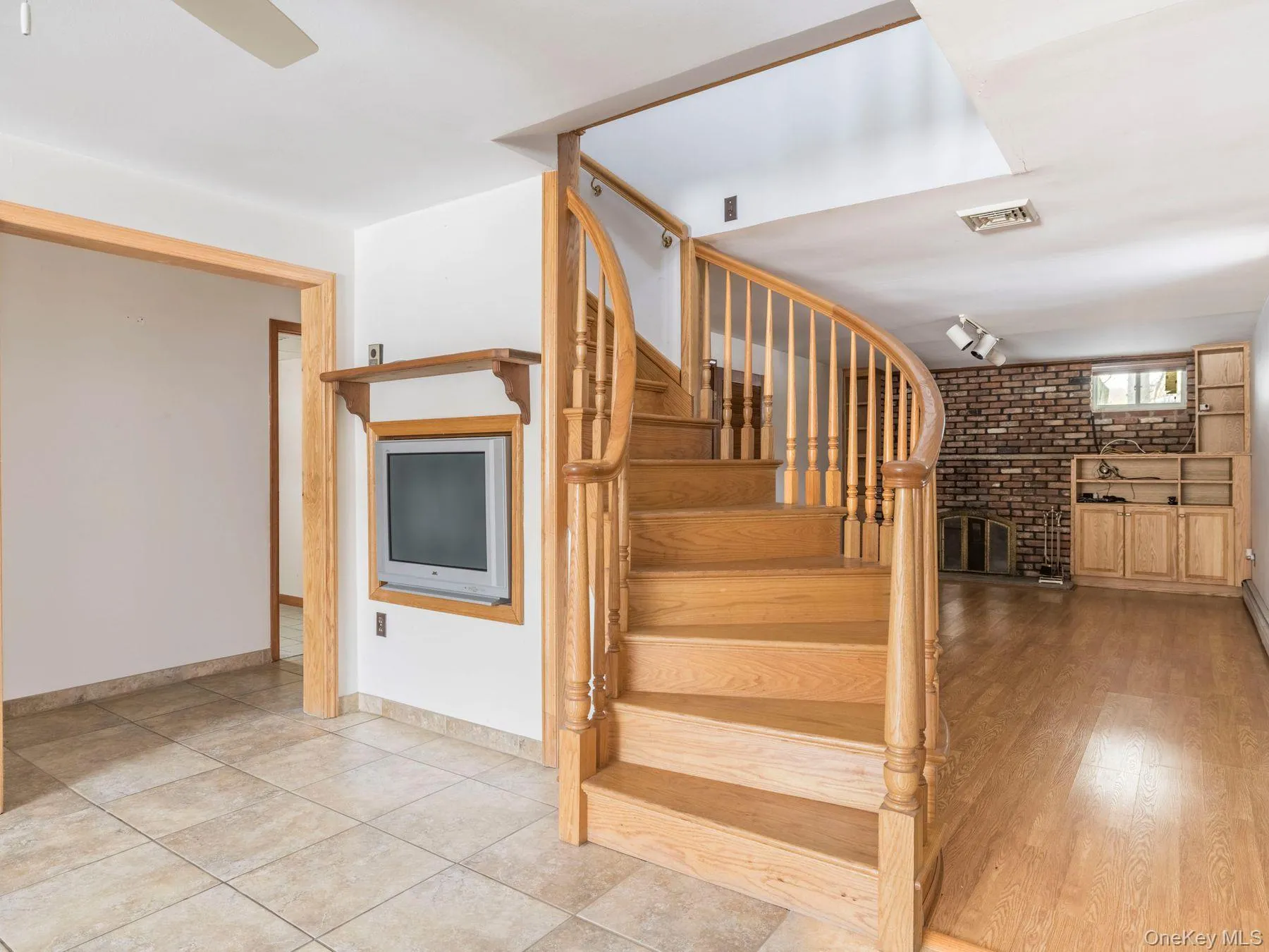 Stairs with rail lighting and brick wall Stairs with rail lighting and brick wall