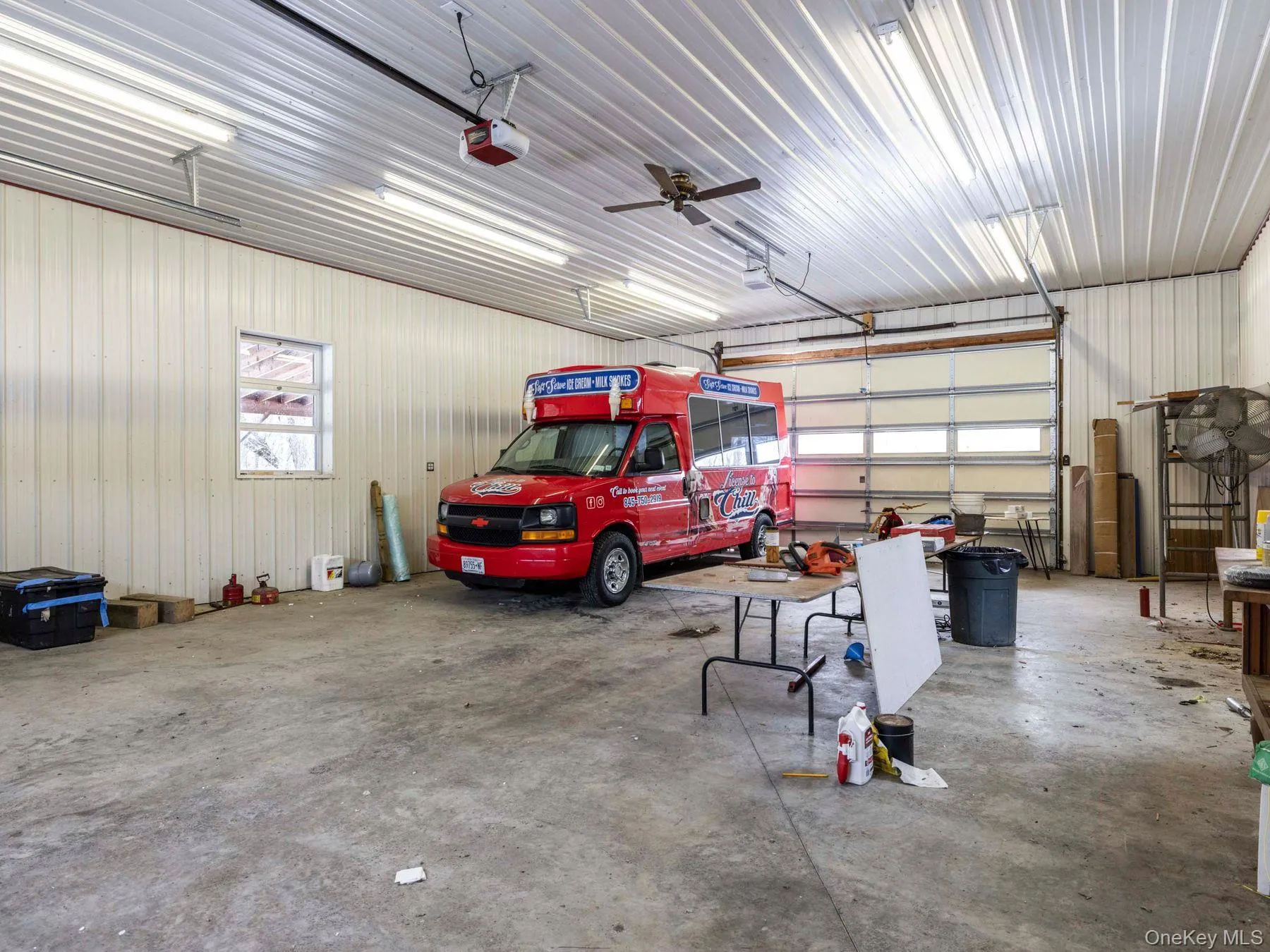 Garage with metal wall and a garage door opener Garage with metal wall and a garage door opener