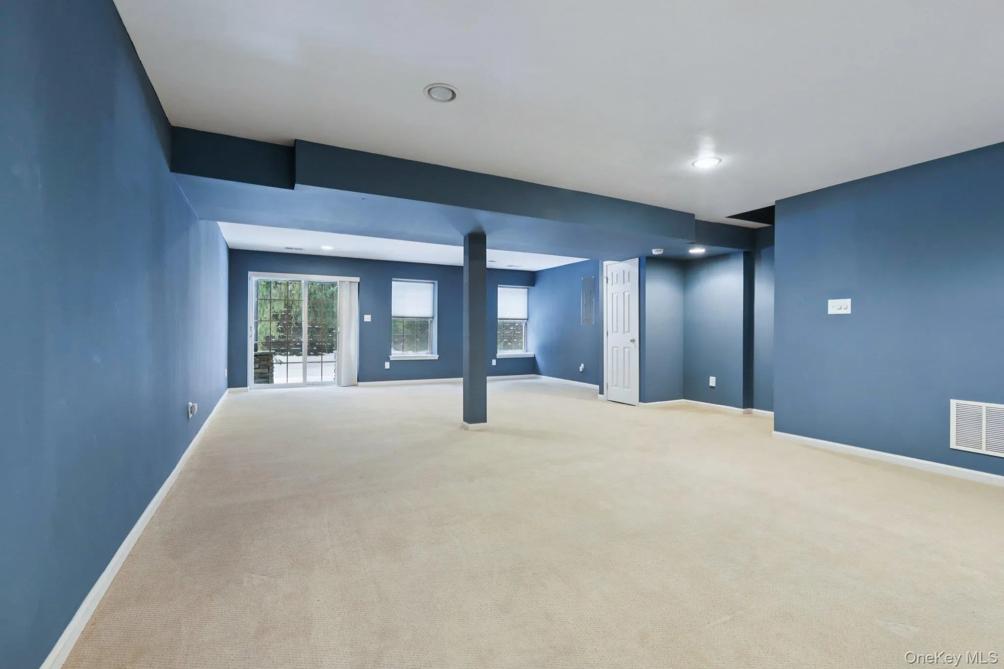 Below grade area with carpet floors and recessed lighting Below grade area with carpet floors and recessed lighting