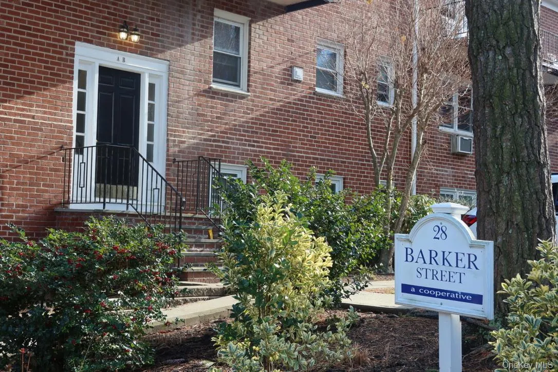 Property entrance with brick siding Property entrance with brick siding