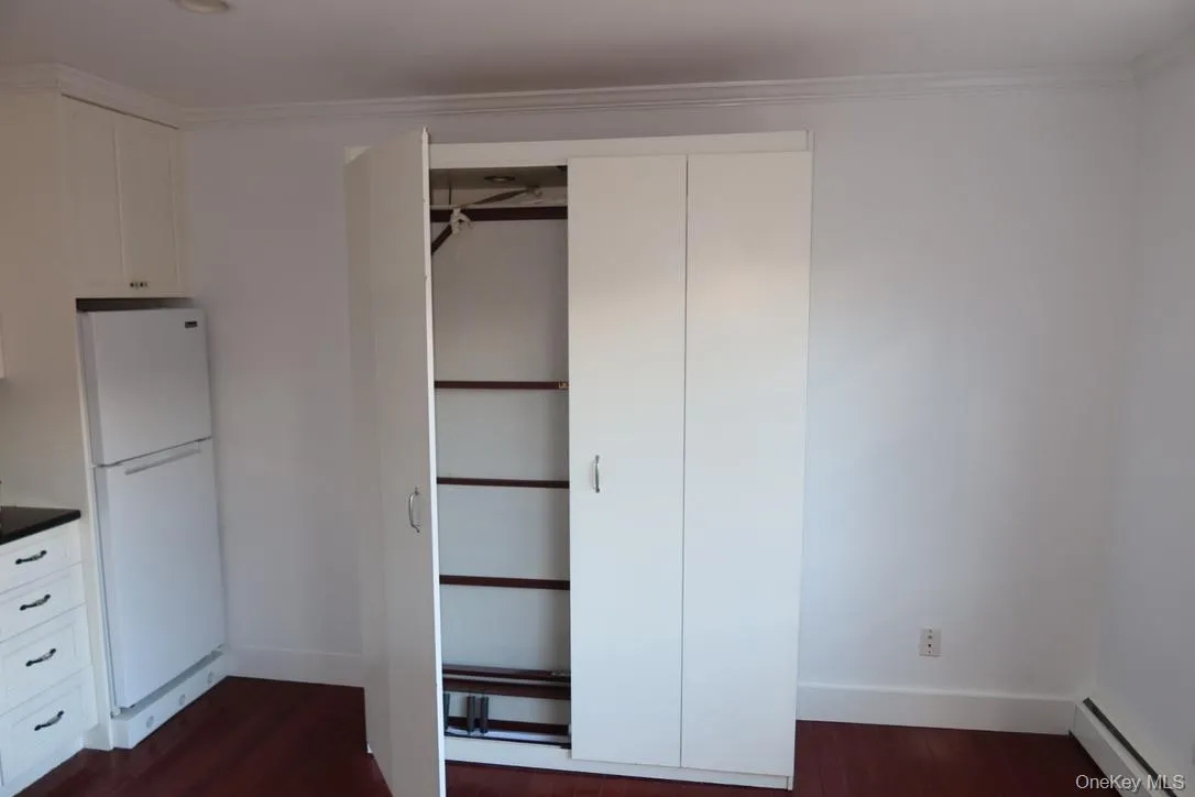 Closet with baseboard heating Closet with baseboard heating