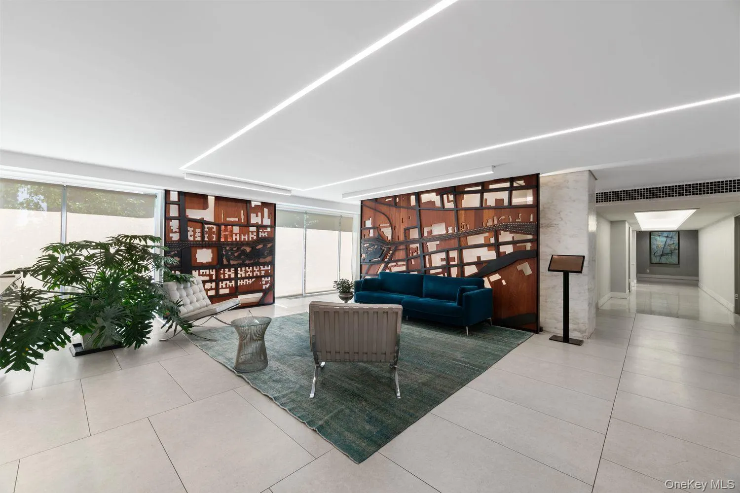 Common area with floor to ceiling windows Common area with floor to ceiling windows