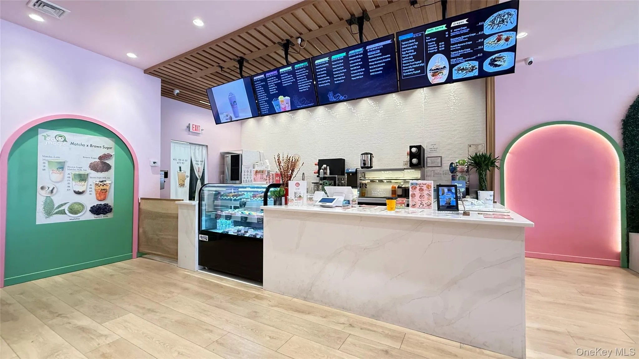 Bar with baseboards, visible vents, wood finished floors, and recessed lighting Bar with baseboards, visible vents, wood finished floors, and recessed lighting