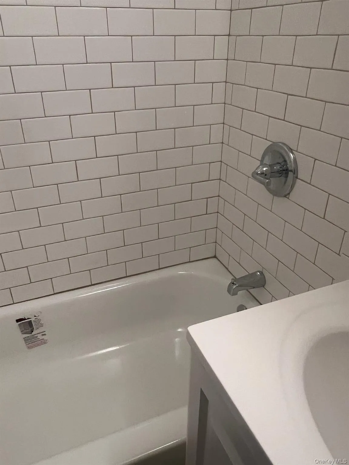 Bathroom featuring vanity and shower combination Bathroom featuring vanity and shower combination