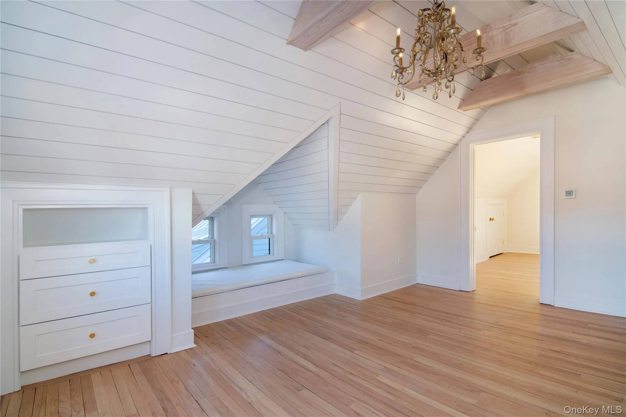 This bonus room offers additional living space with thoughtful built-ins. This bonus room offers additional living space with thoughtful built-ins.