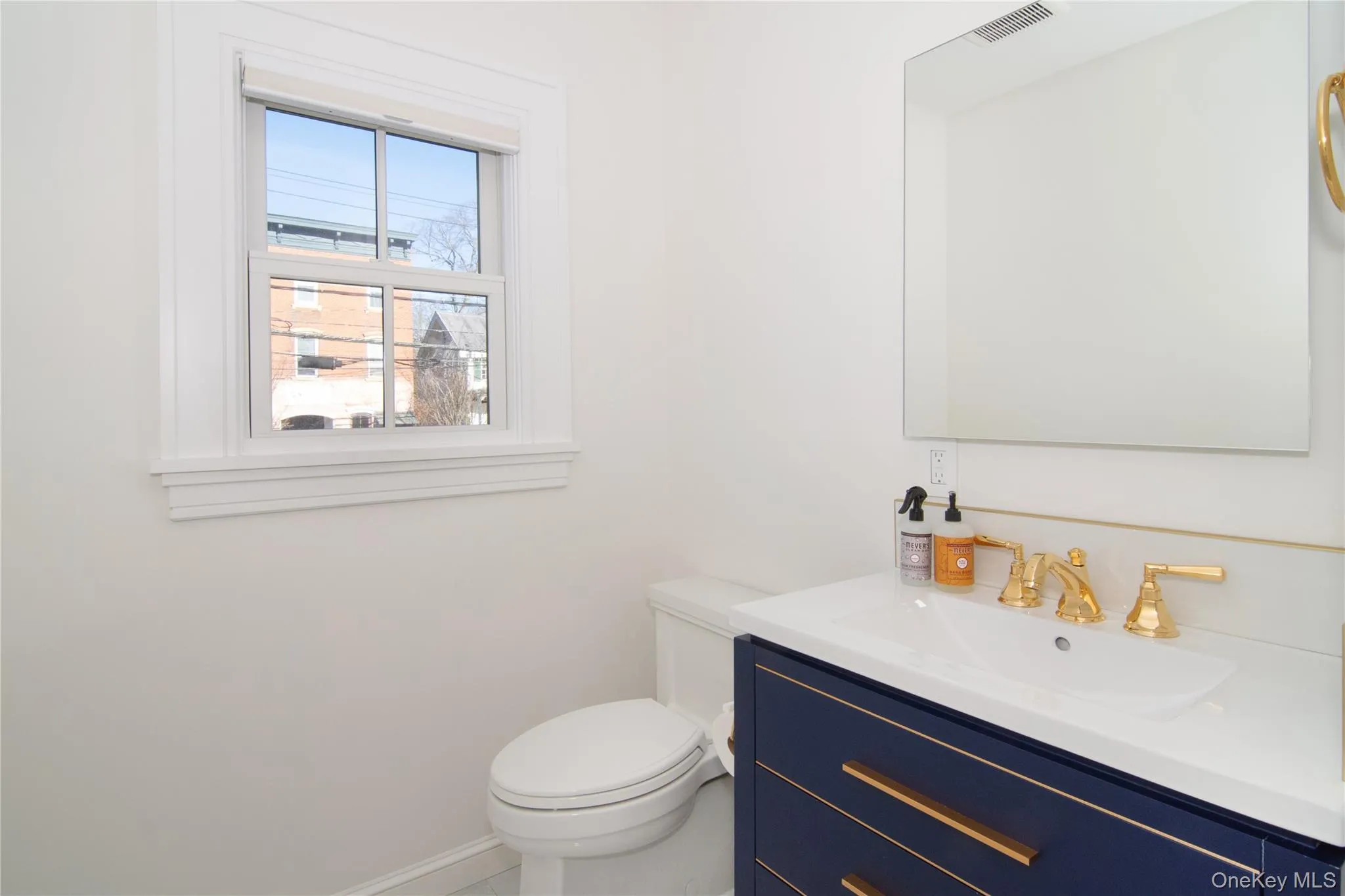 This view shows the bathroom’s clean layout with natural light This view shows the bathroom’s clean layout with natural light