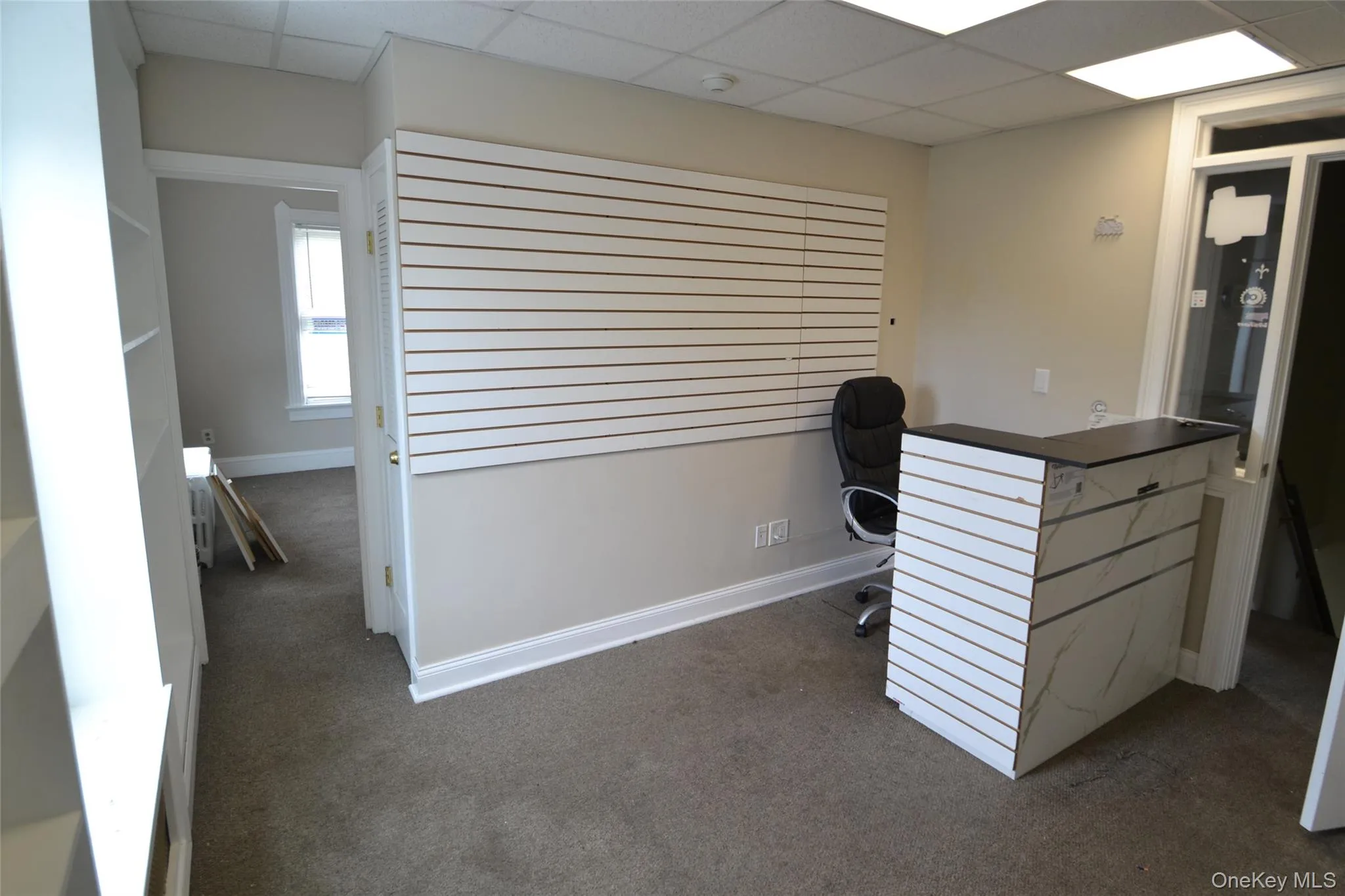 Unfurnished office featuring a paneled ceiling Unfurnished office featuring a paneled ceiling