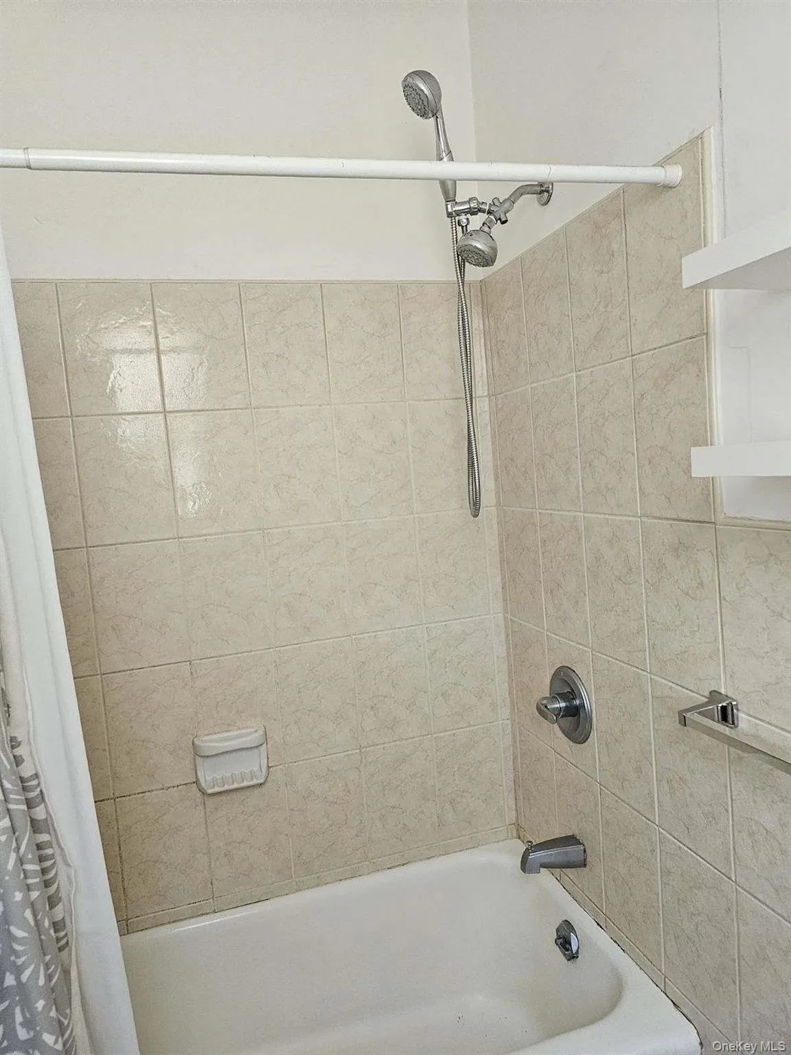 Full bathroom with shower / bath combo Full bathroom with shower / bath combo