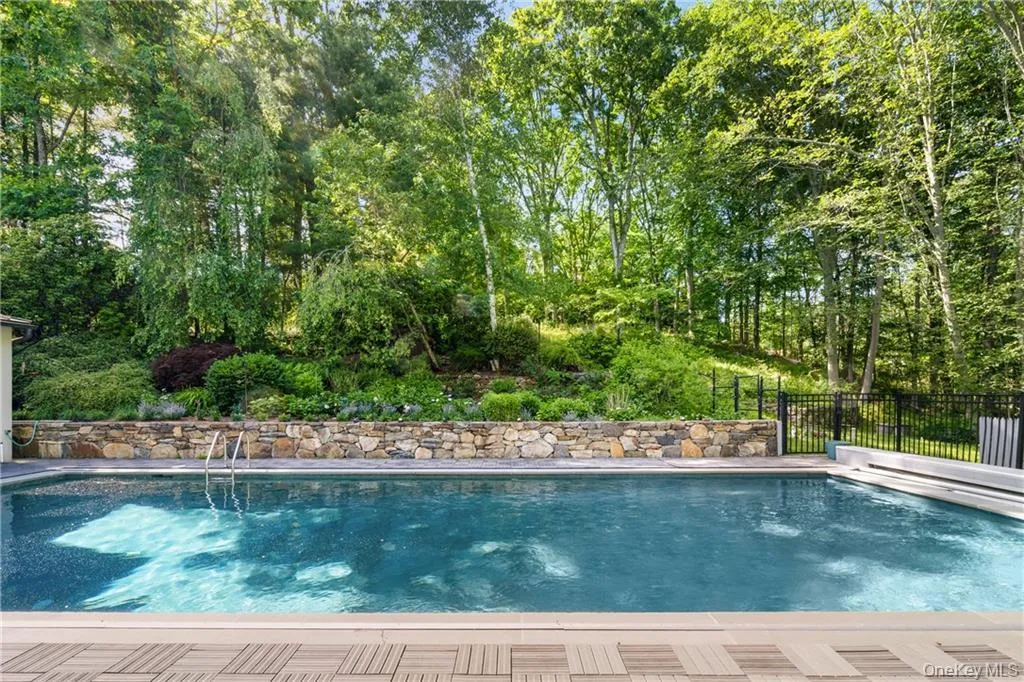 Outdoor pool featuring a patio area Outdoor pool featuring a patio area