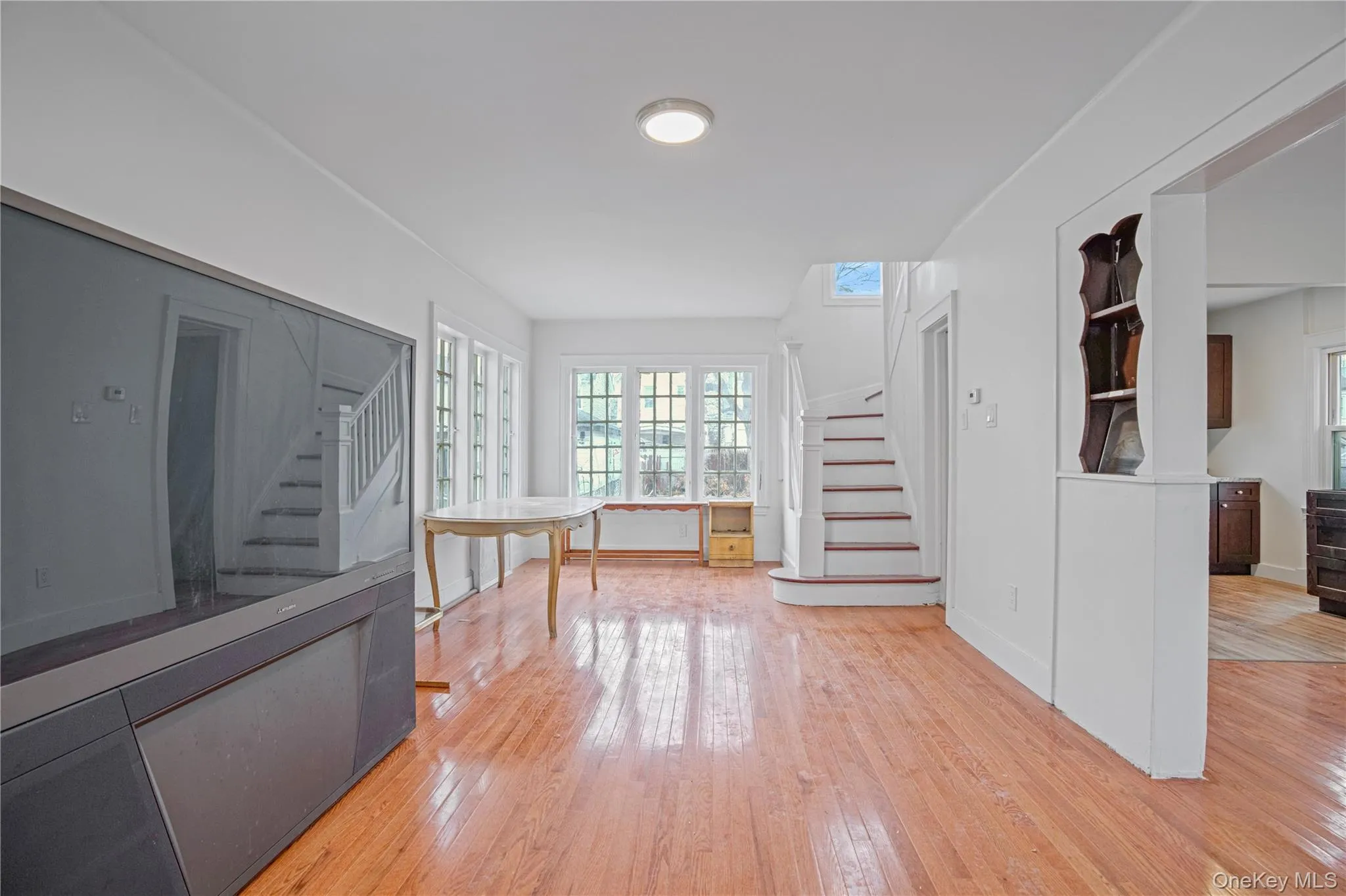 Hall with stairway and light wood-type flooring Hall with stairway and light wood-type flooring
