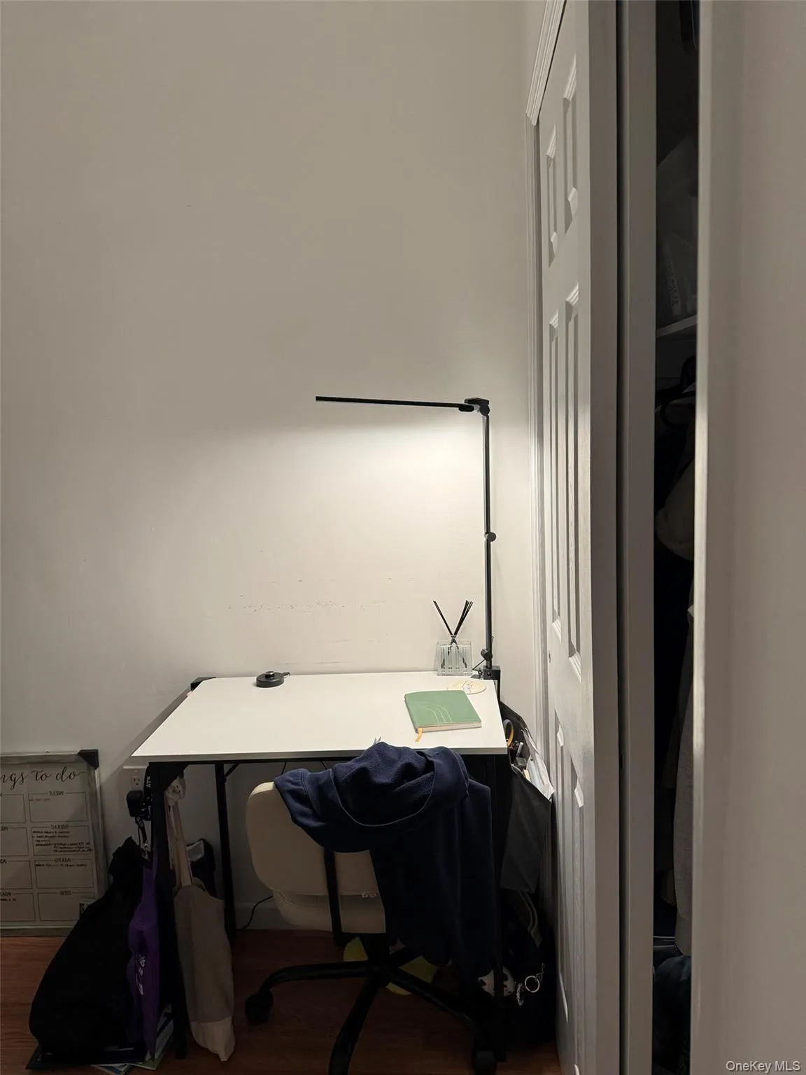 Home office featuring wood finished floors Home office featuring wood finished floors