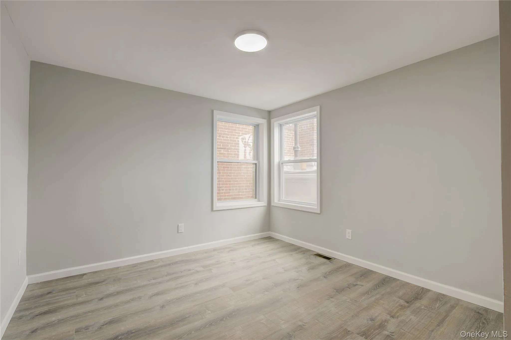 Spare room with light wood-type flooring Spare room with light wood-type flooring