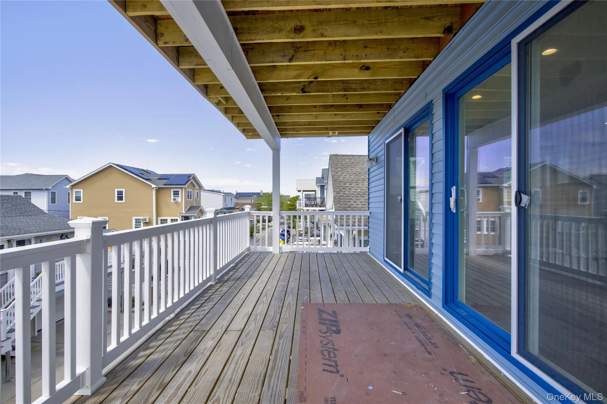 Wooden deck with a residential view Wooden deck with a residential view
