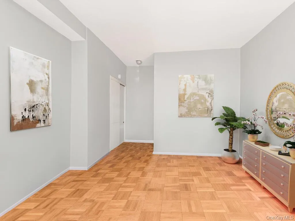 Hall featuring baseboards Hall featuring baseboards