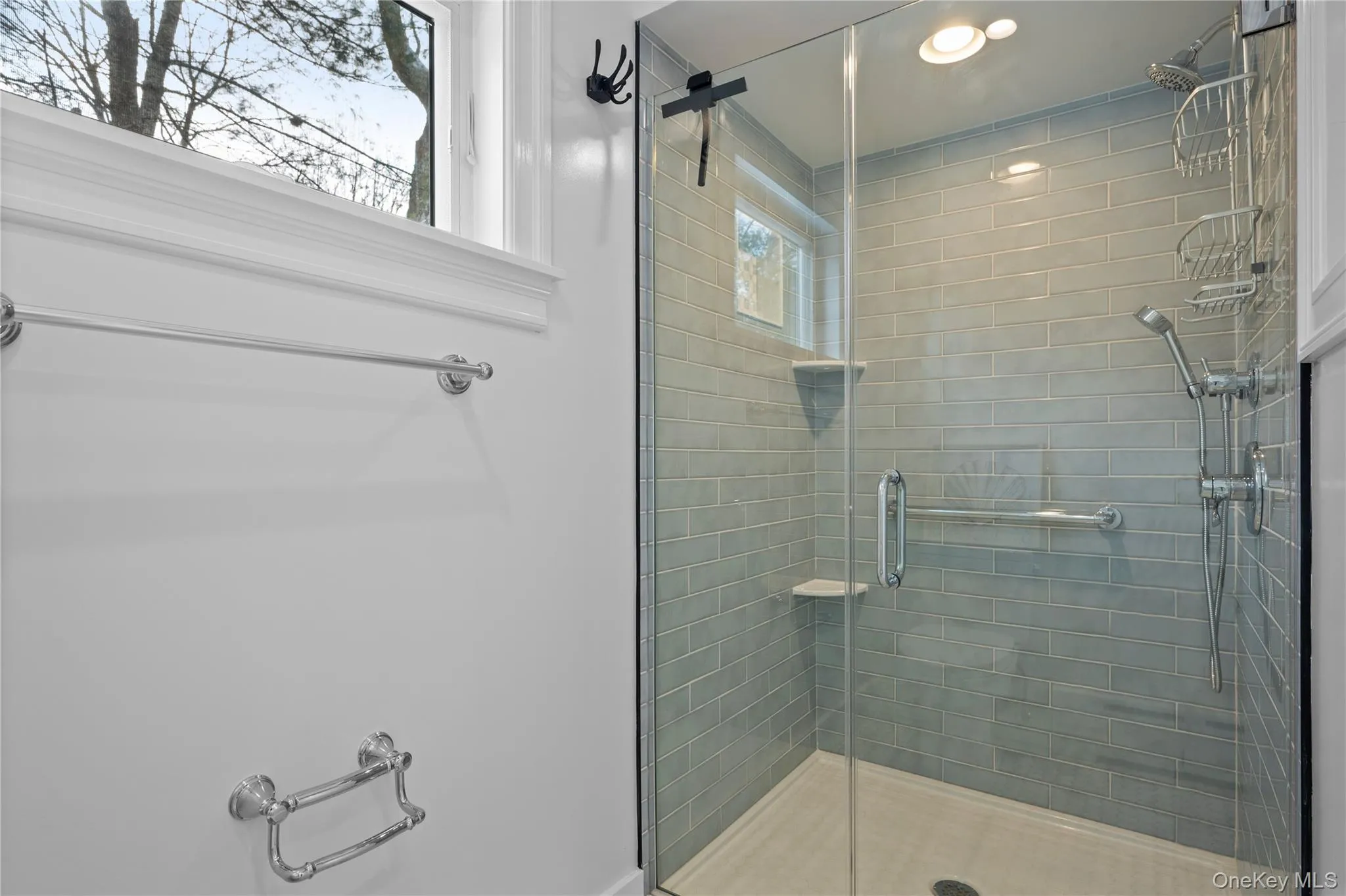 Full bathroom with a stall shower and recessed lighting Full bathroom with a stall shower and recessed lighting