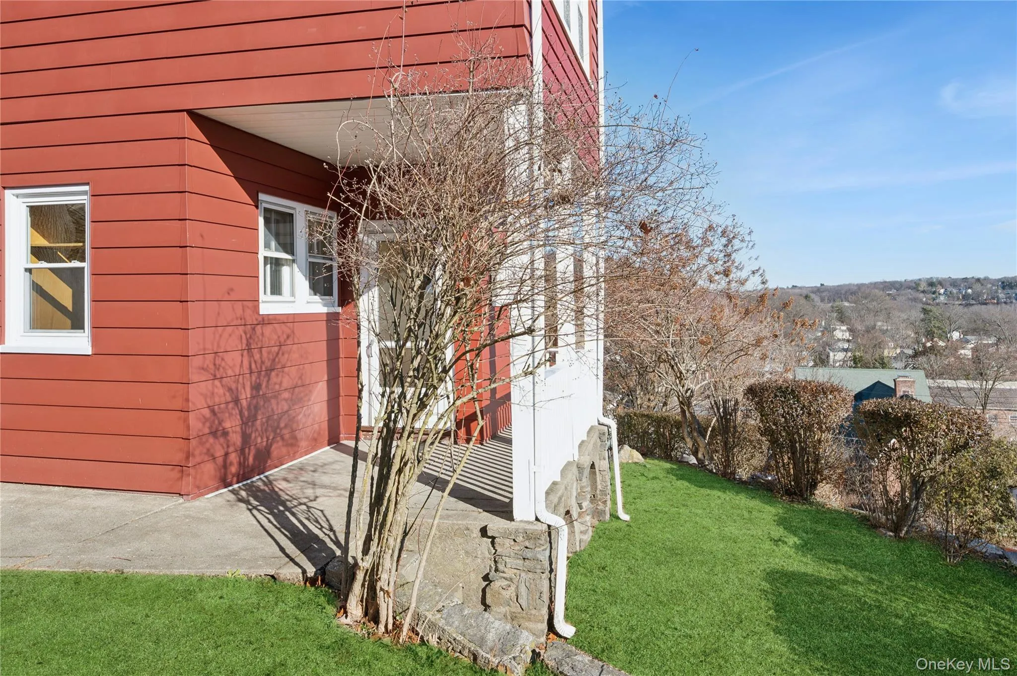 View of home's exterior featuring a lawn View of home's exterior featuring a lawn