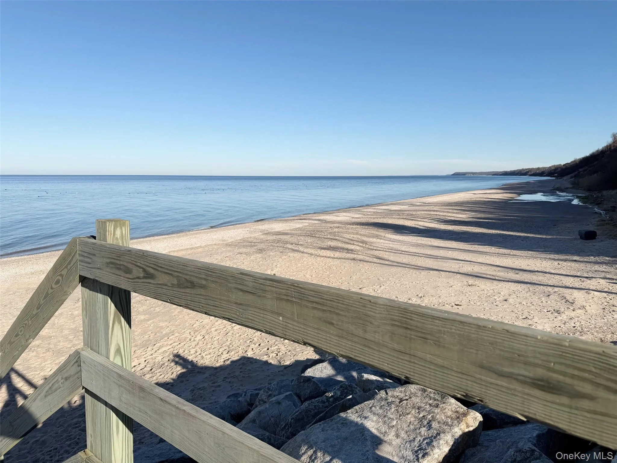 Water view featuring nearby beach Water view featuring nearby beach