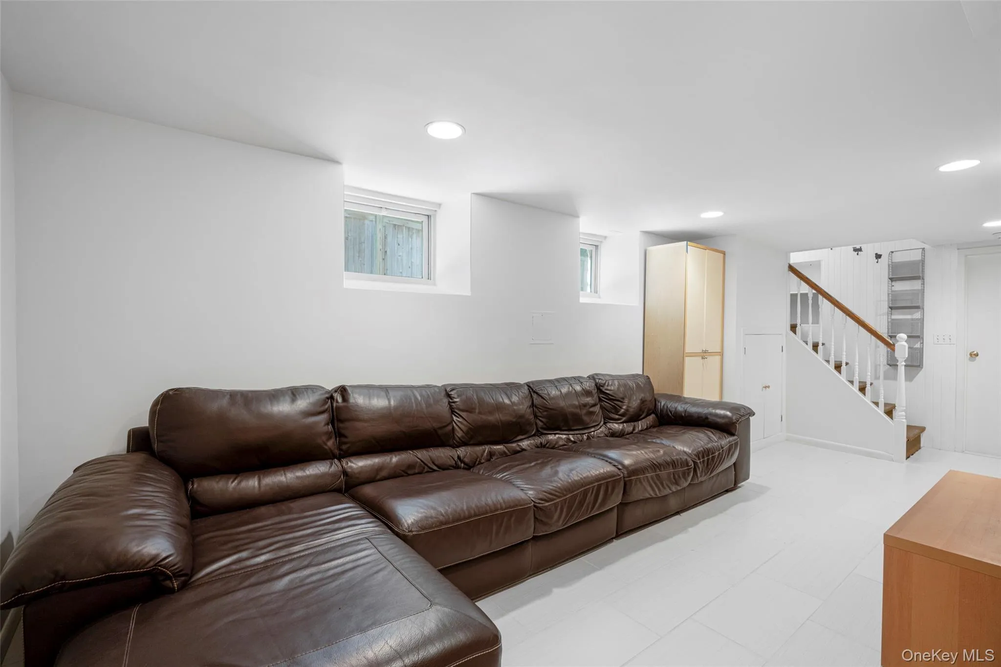 Basement rec area with view to laundry Basement rec area with view to laundry