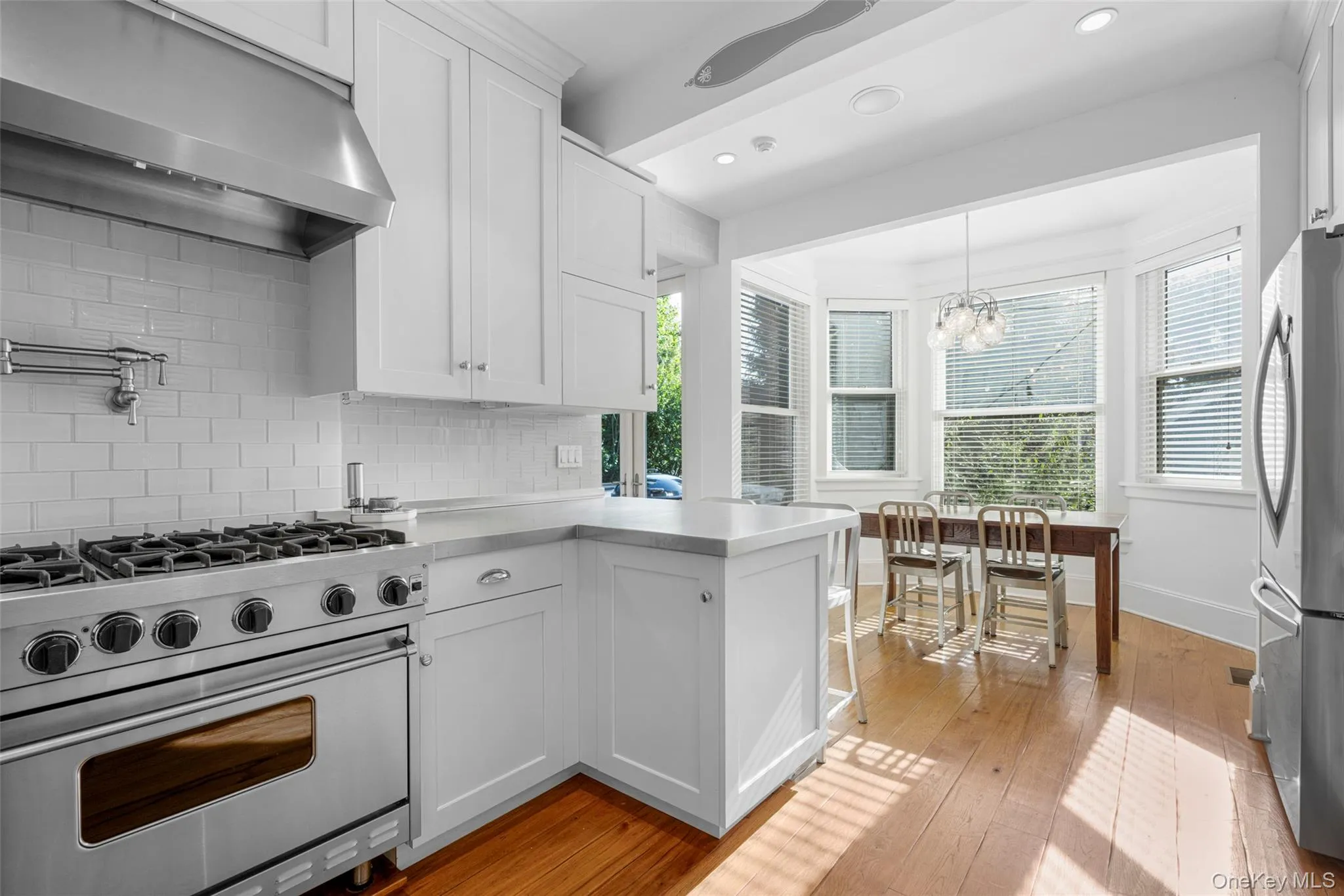 Kitchen looking into breakfast sunroom Kitchen looking into breakfast sunroom