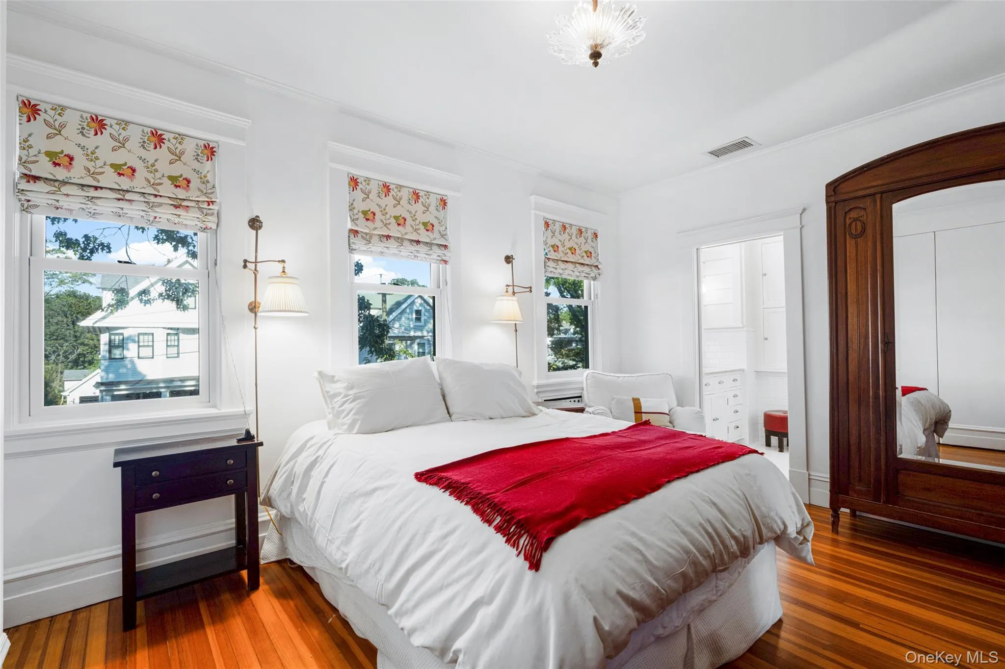 View of primary bedroom with door to bath View of primary bedroom with door to bath