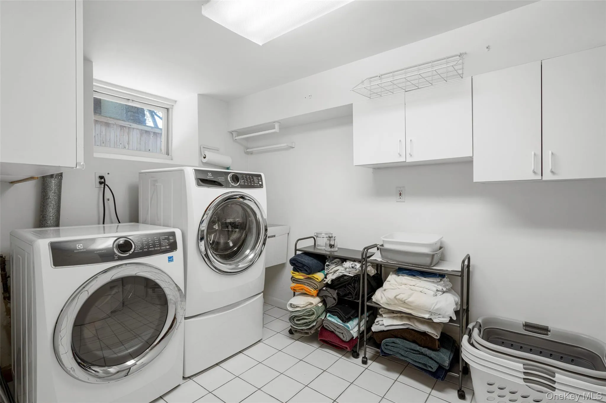Laundry conveniently located in basement just steps down from kitchen Laundry conveniently located in basement just steps down from kitchen
