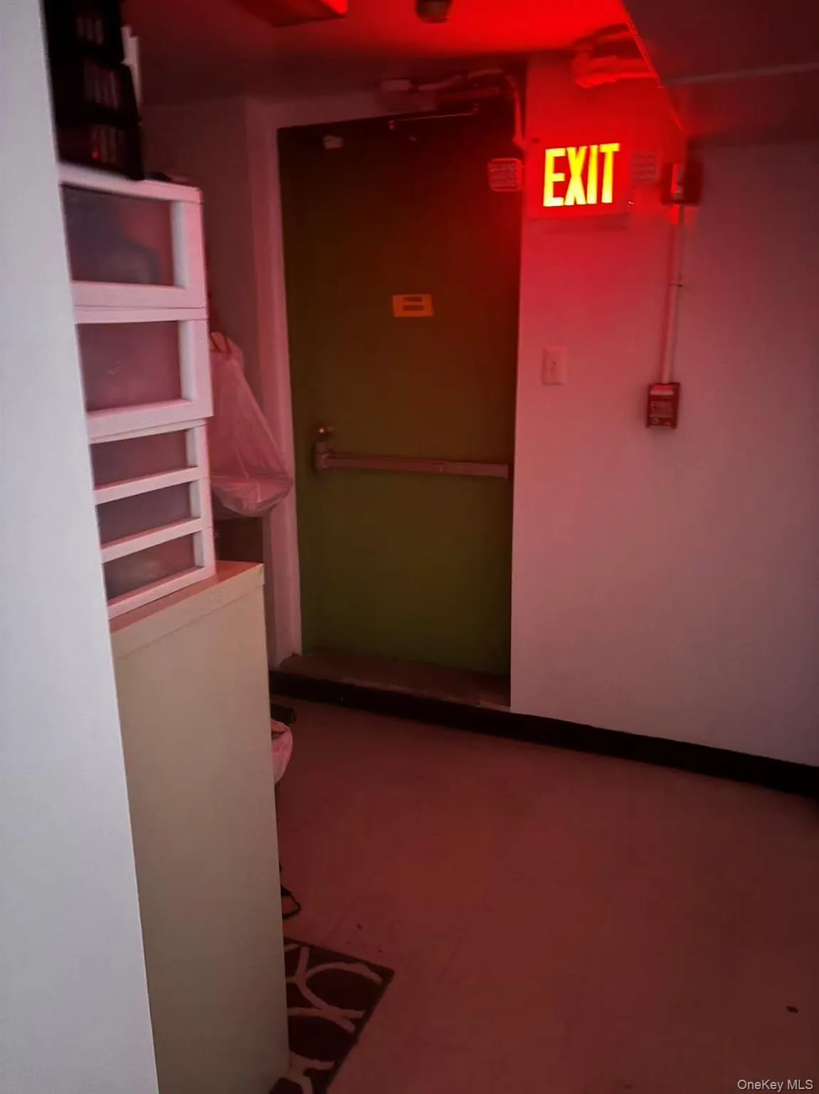 Hall featuring tile patterned floors Hall featuring tile patterned floors