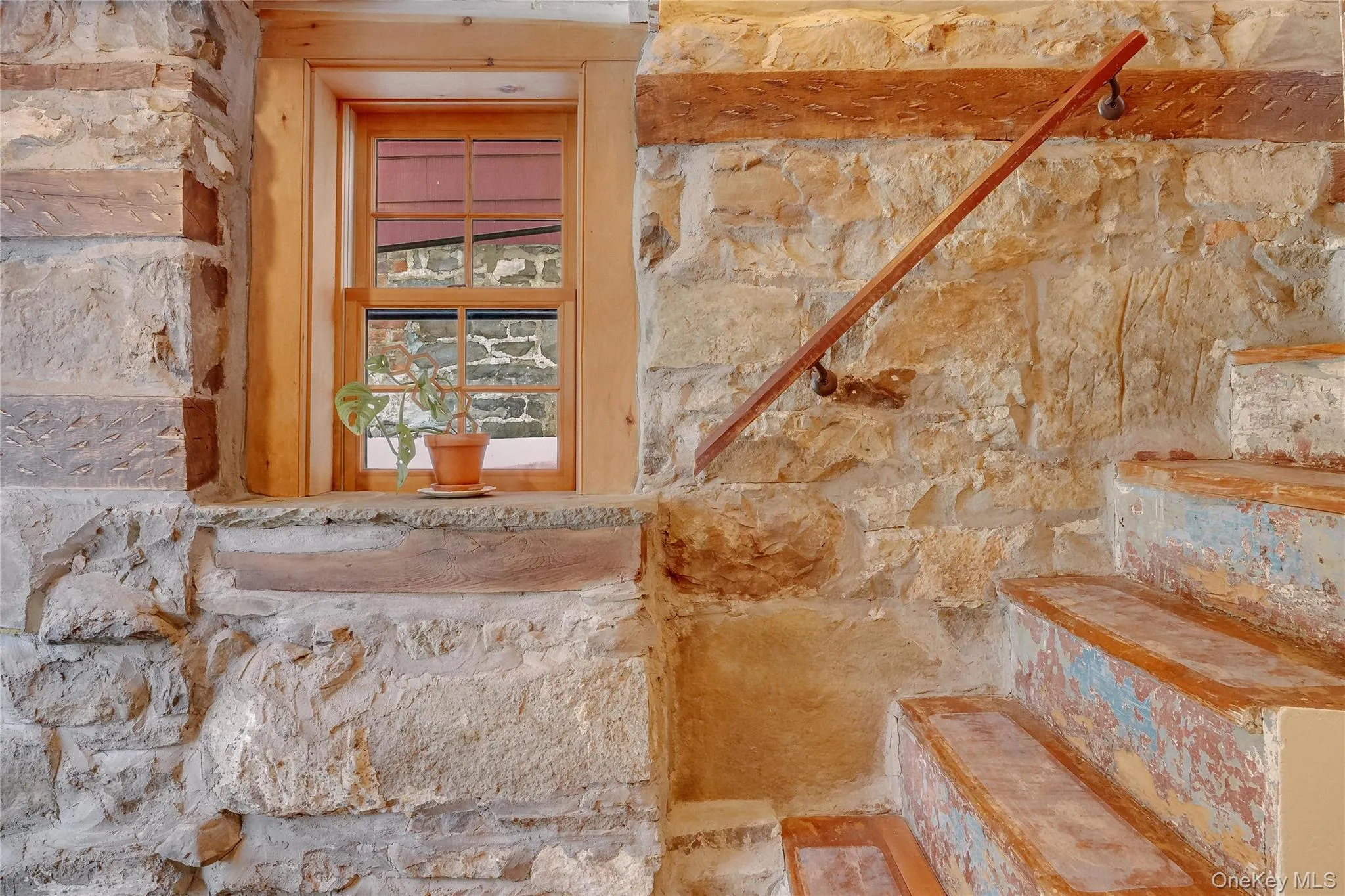 Original stone steps and bluestone window sills. Original stone steps and bluestone window sills.