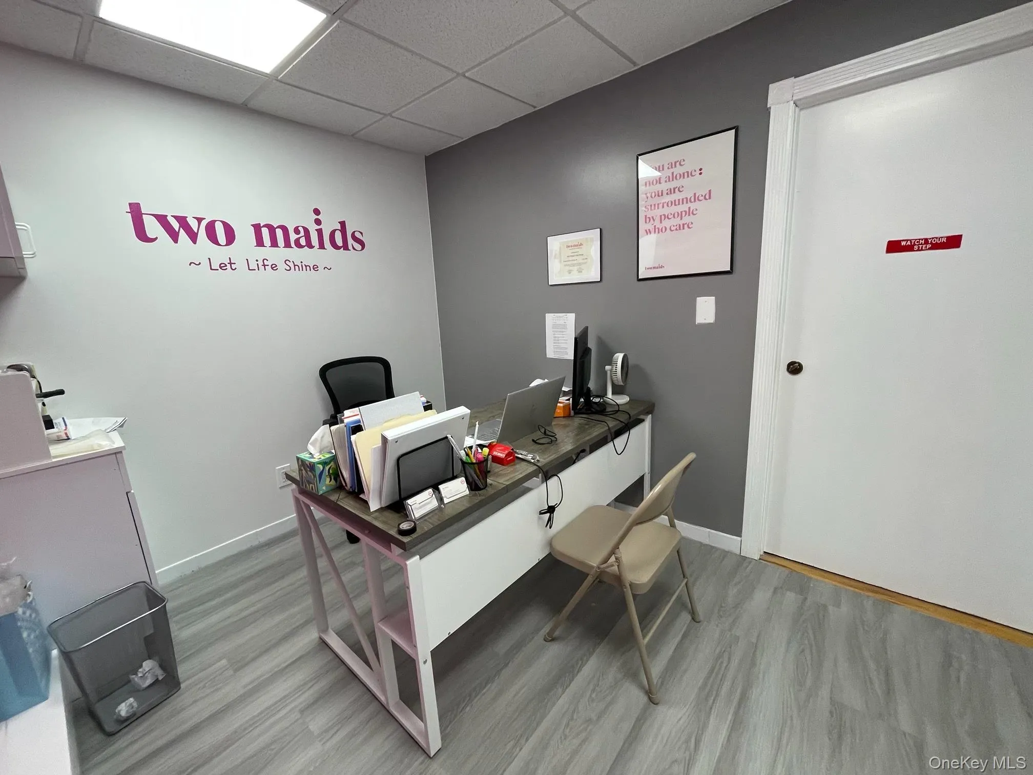 Home office featuring a drop ceiling Home office featuring a drop ceiling