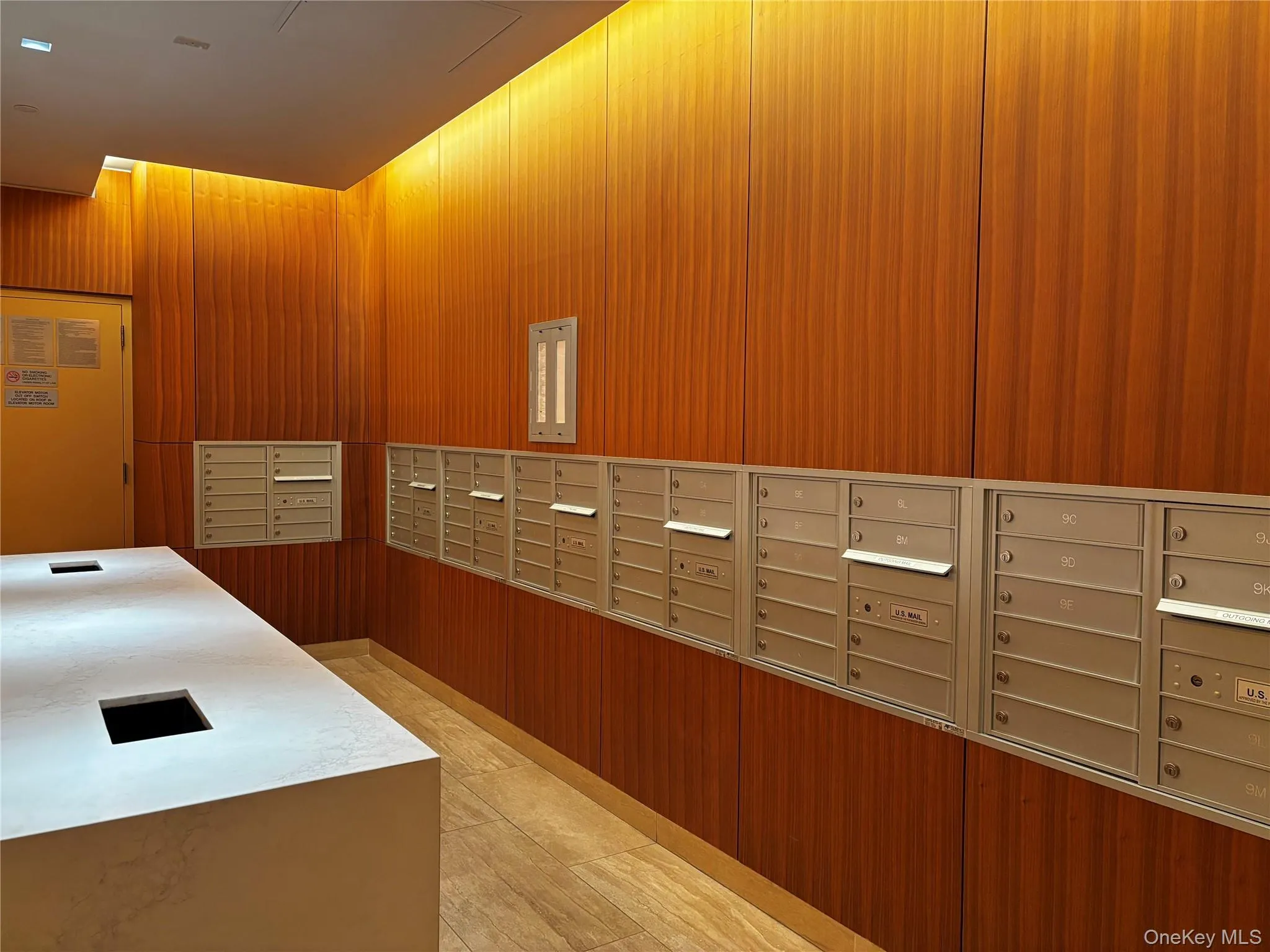 View of home's community with wood walls View of home's community with wood walls