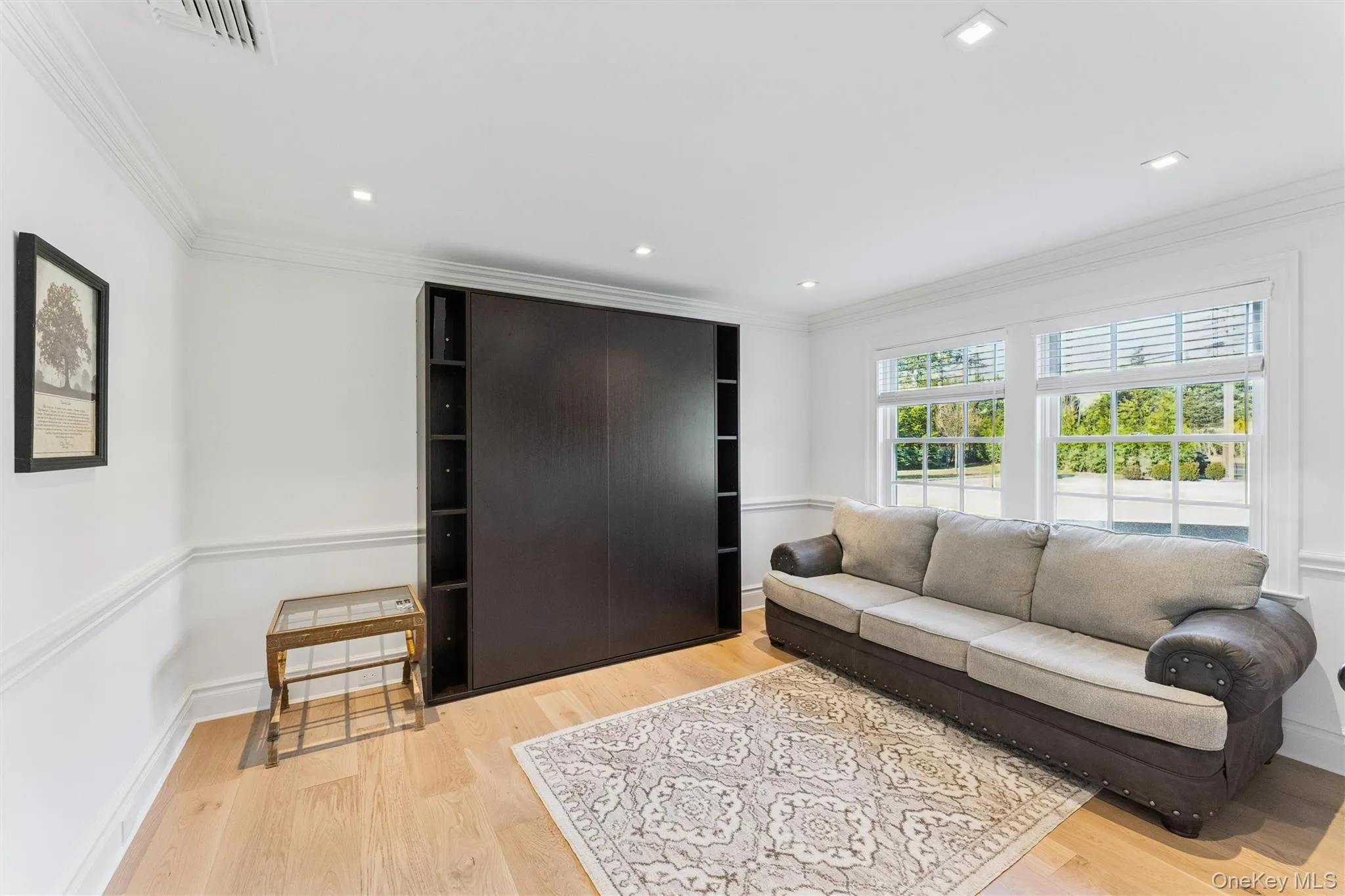 Office with light wood floors, and recessed lighting. Office with light wood floors, and recessed lighting.