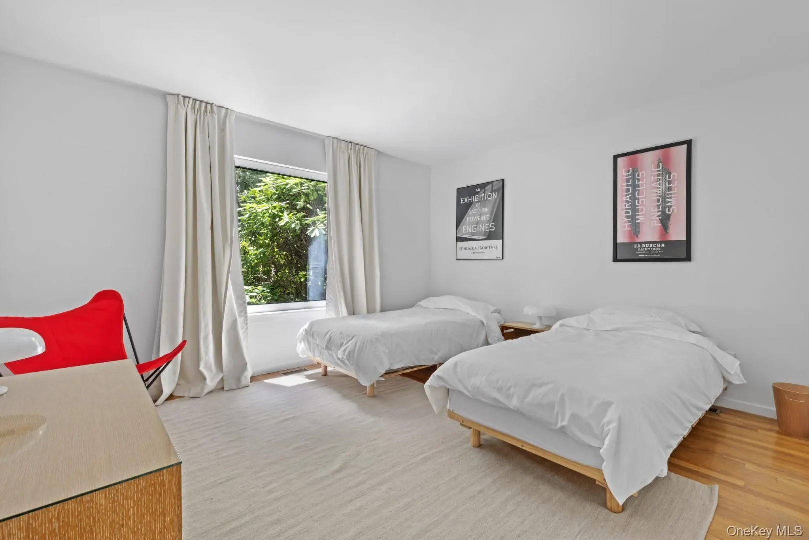 Bedroom with wood finished floors Bedroom with wood finished floors