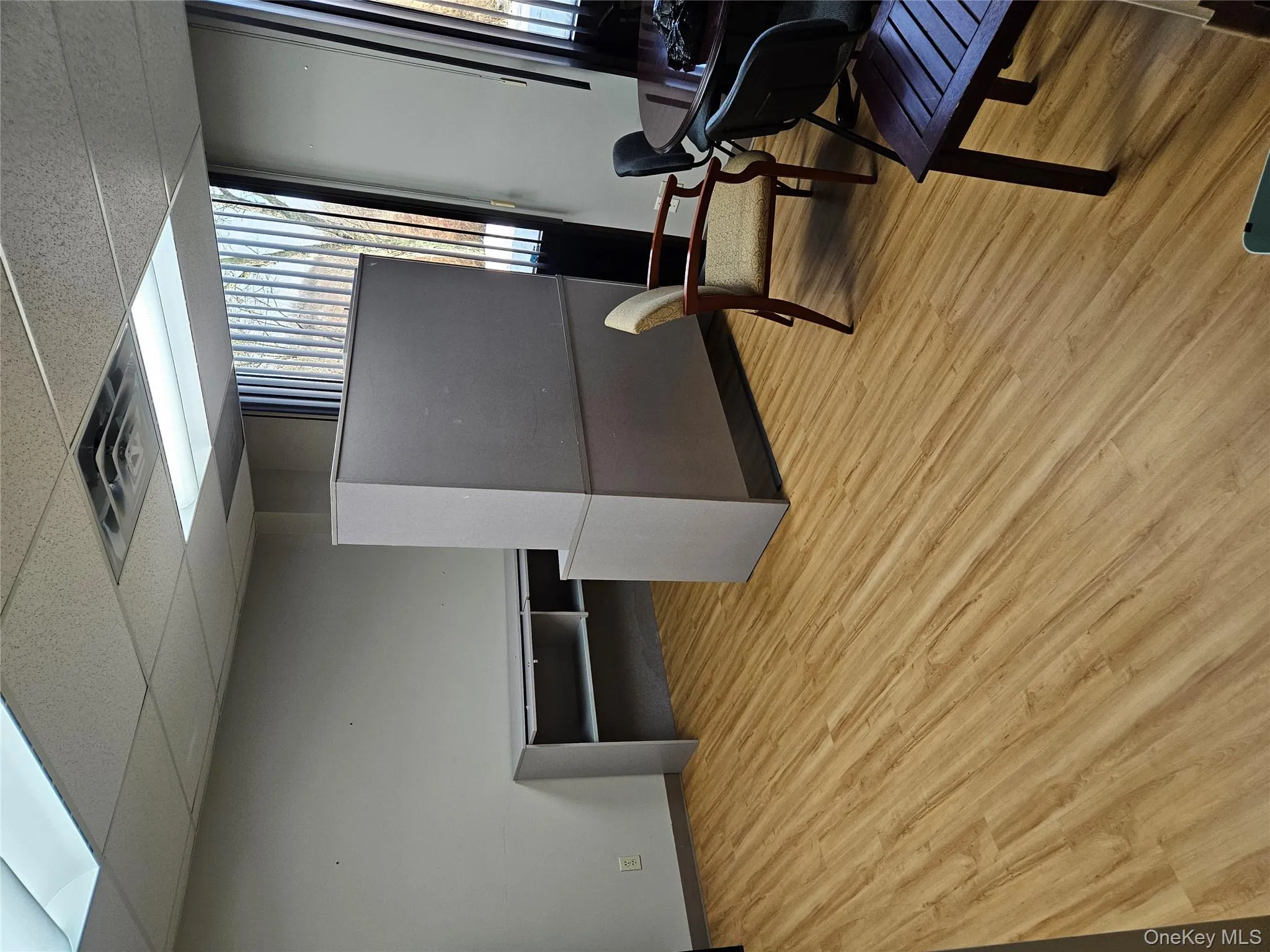 Office area featuring a paneled ceiling Office area featuring a paneled ceiling