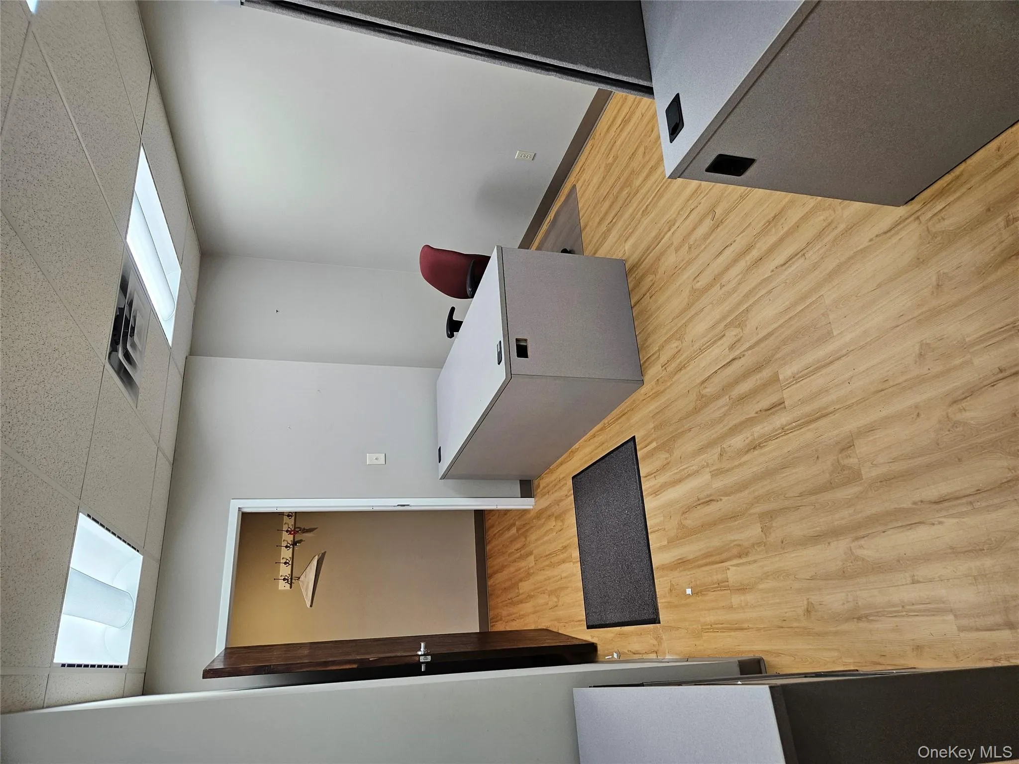 Home office featuring a drop ceiling Home office featuring a drop ceiling