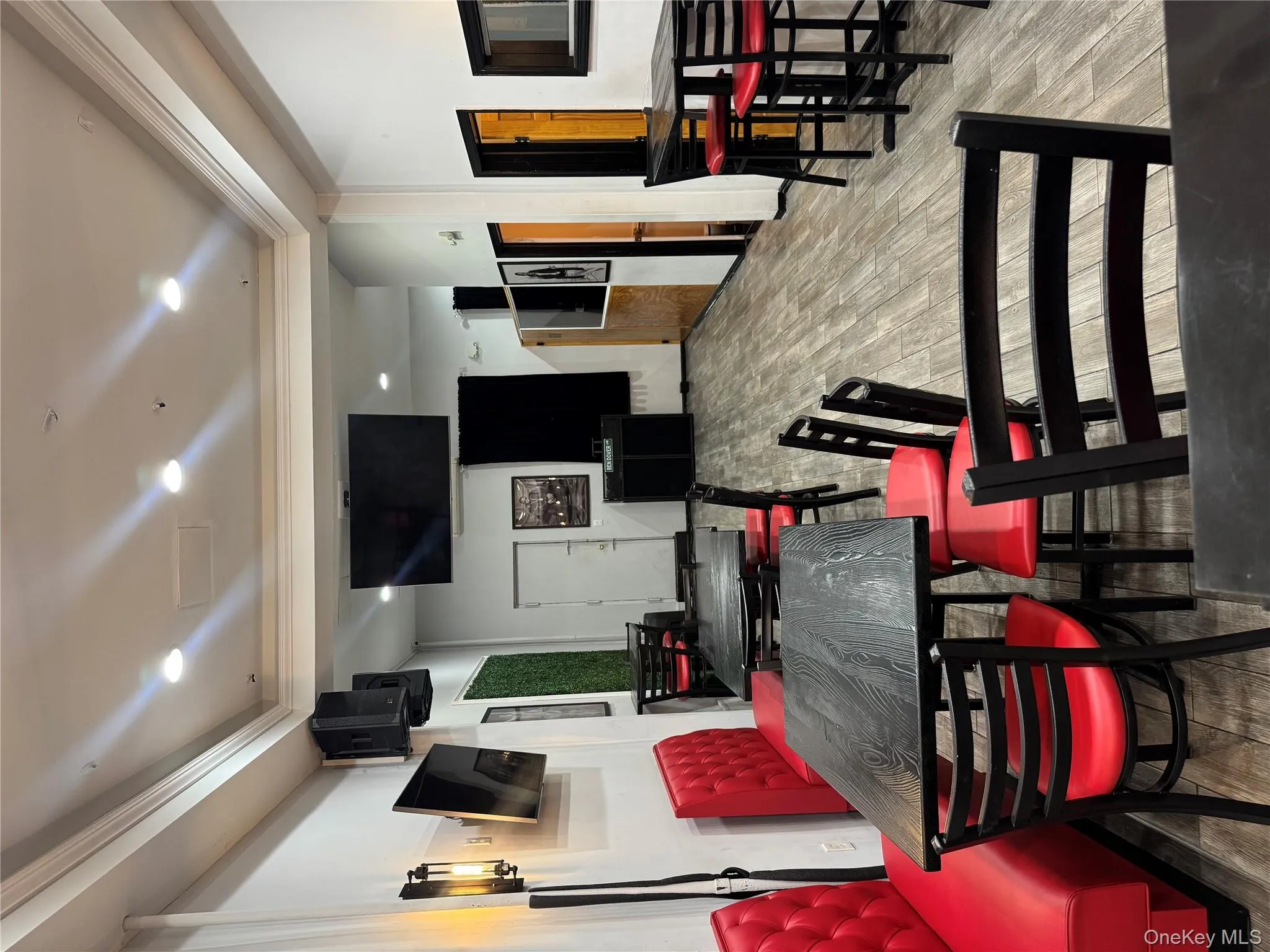 Dining room featuring light wood-type flooring, a tray ceiling, crown molding, and recessed lighting Dining room featuring light wood-type flooring, a tray ceiling, crown molding, and recessed lighting