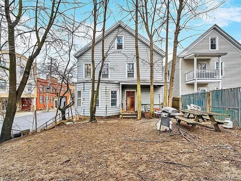 Back of property featuring a fenced backyard Back of property featuring a fenced backyard