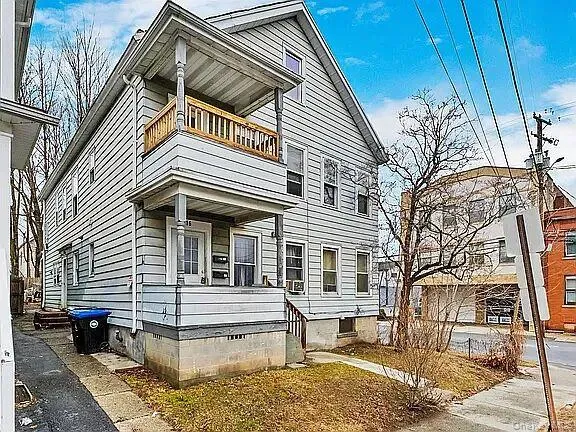 View of front of property featuring a balcony and crawl space View of front of property featuring a balcony and crawl space