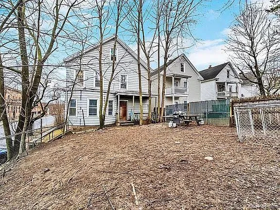 View of back of property featuring a residential view View of back of property featuring a residential view