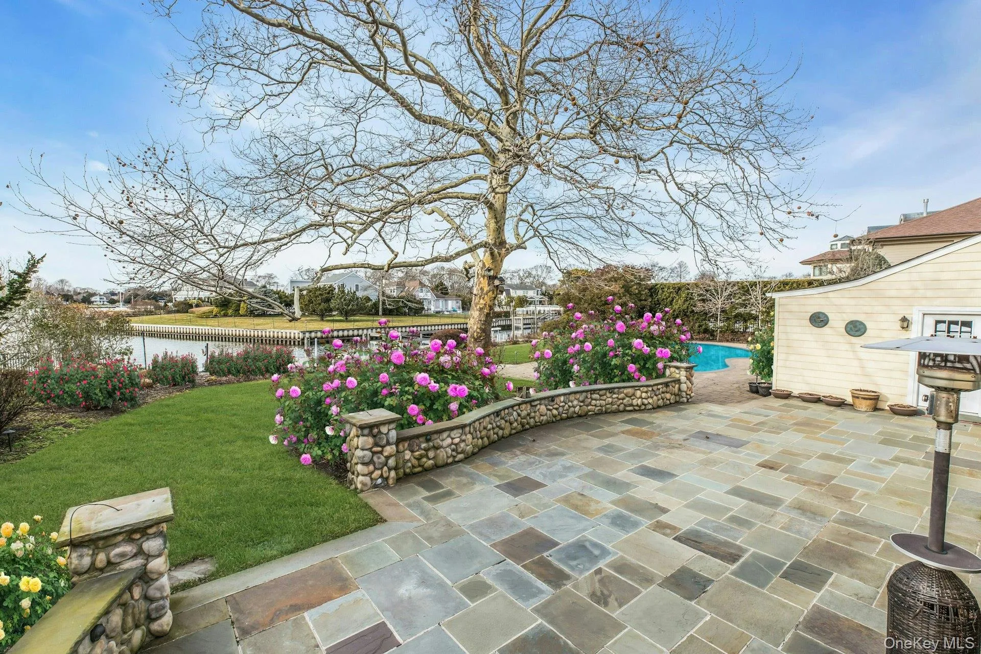 View of patio / terrace featuring a water view