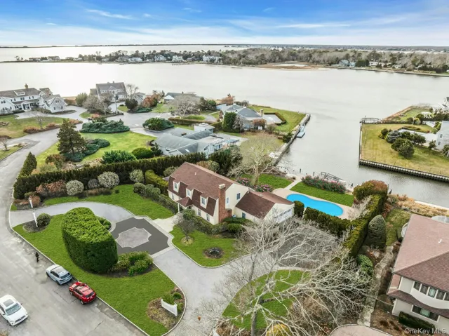 Aerial view of residential area with a large body of water
